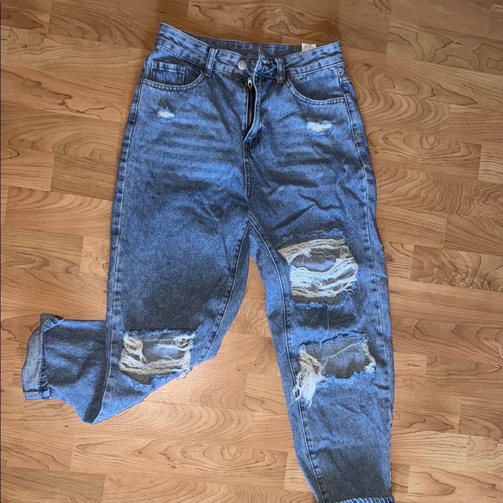 Distressed Blue Denim Jeans